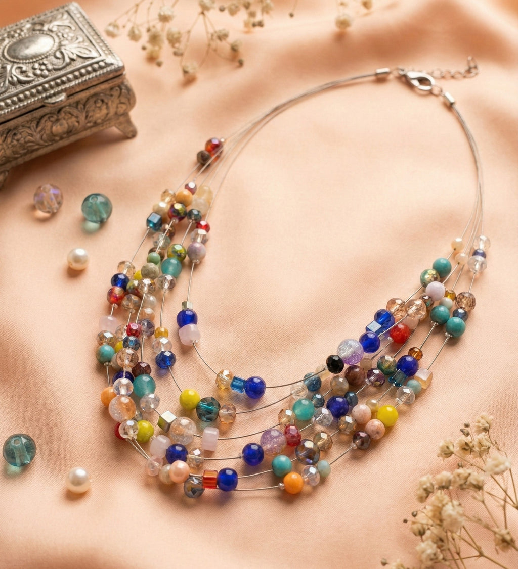A multi-layered wire necklace featuring a vibrant mix of colorful glass and stone beads