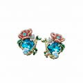 A pair of gold-toned stud earrings featuring large teal faceted crystals surrounded by pink, white, and peach enamel flowers and green leaves