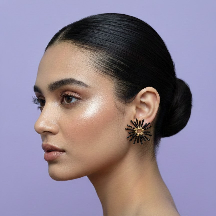 Pair of sculptural black enamel coral branch earrings with gold centers