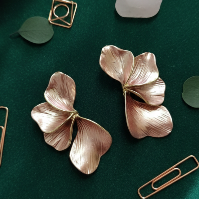 Pair of unique metallic fan petal studs