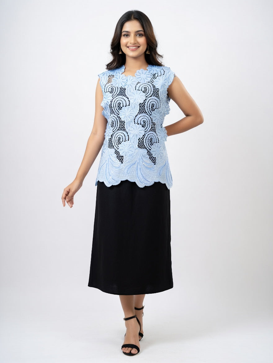 a blue scalloped-edge cutwork top